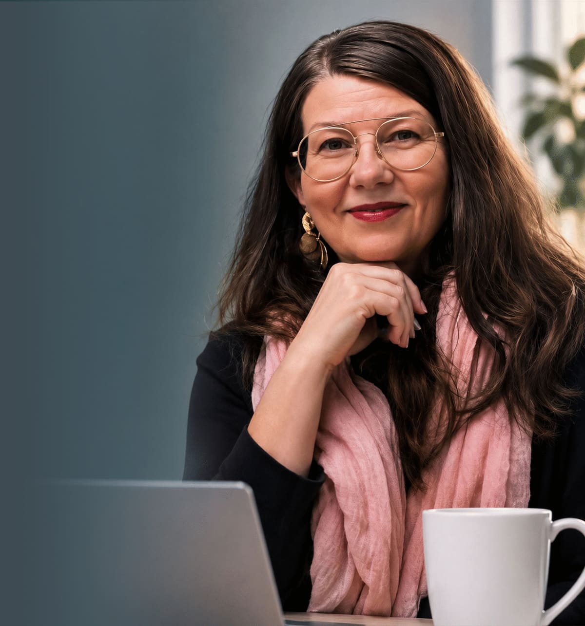 Pauliina Härkönen, who runs Sigila, at her laptop